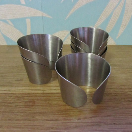 Set of 6 1970s stainless steel cuff napkin rings