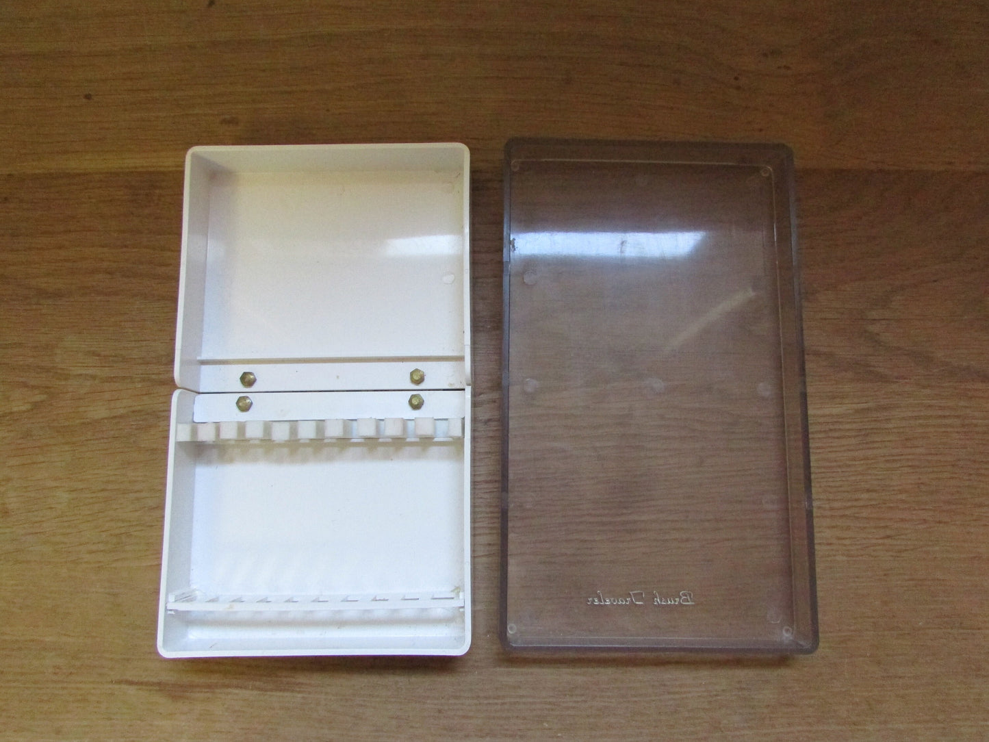 Vintage plastic 'Brush Traveler' paint brush holder