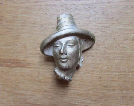 Vintage gold-painted plaster/chalkware lady in hat head brooch