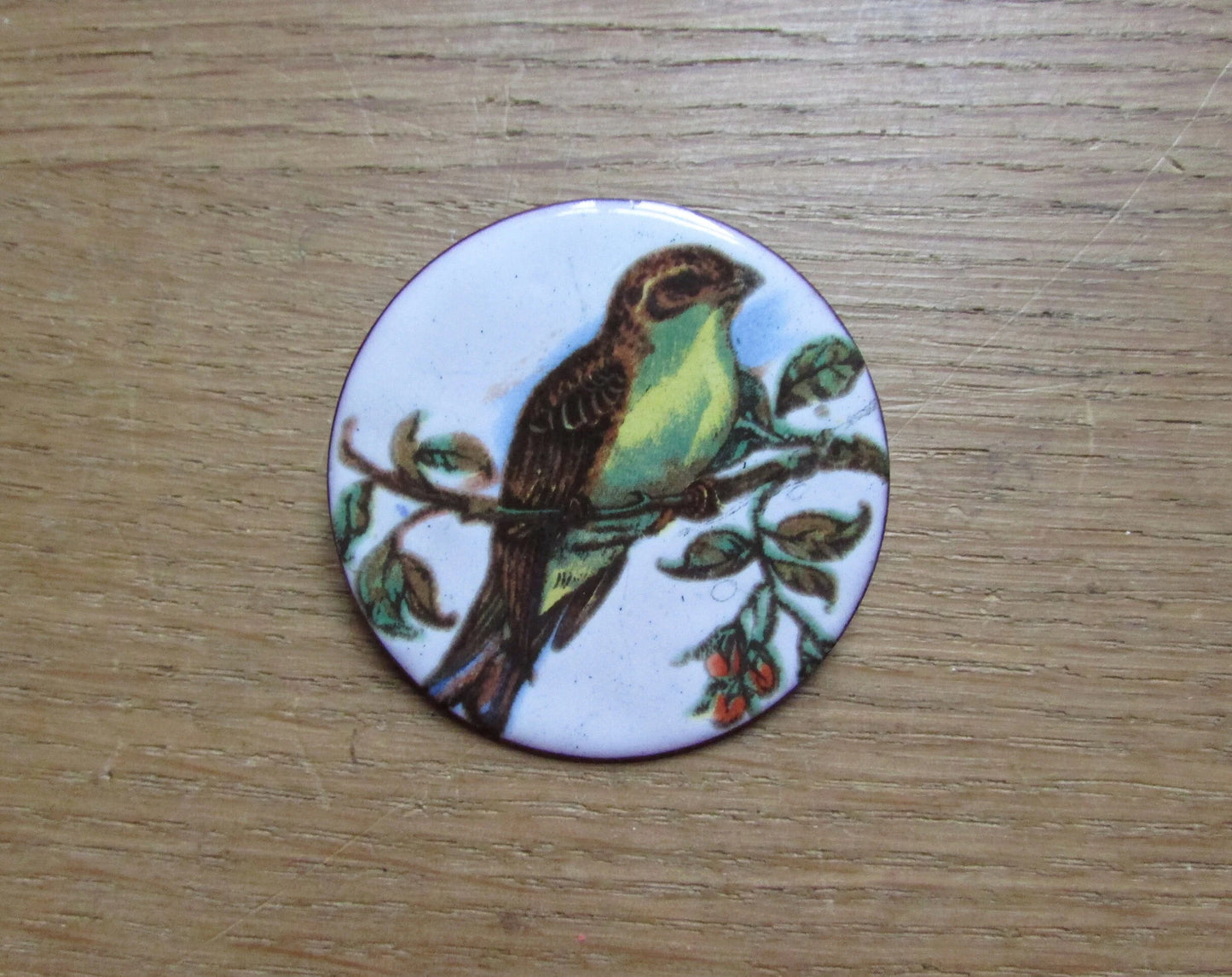 1960s handmade copper & enamel bird on branch motif brooch
