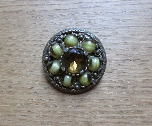 1970s round Celtic-style pendant/brooch, polished green stones with citrine centre, stamped MIRACLE