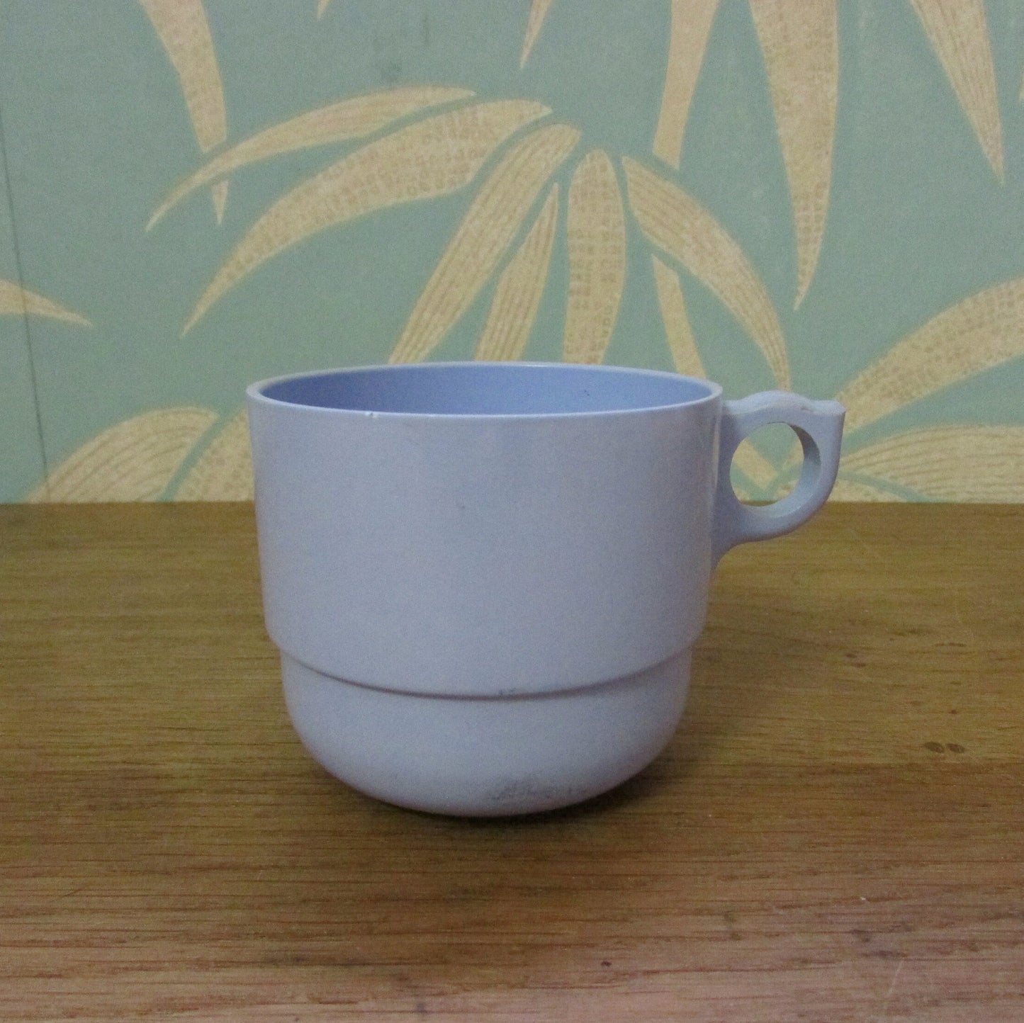 Set of four 1960s pale blue plastic stacking picnic mugs