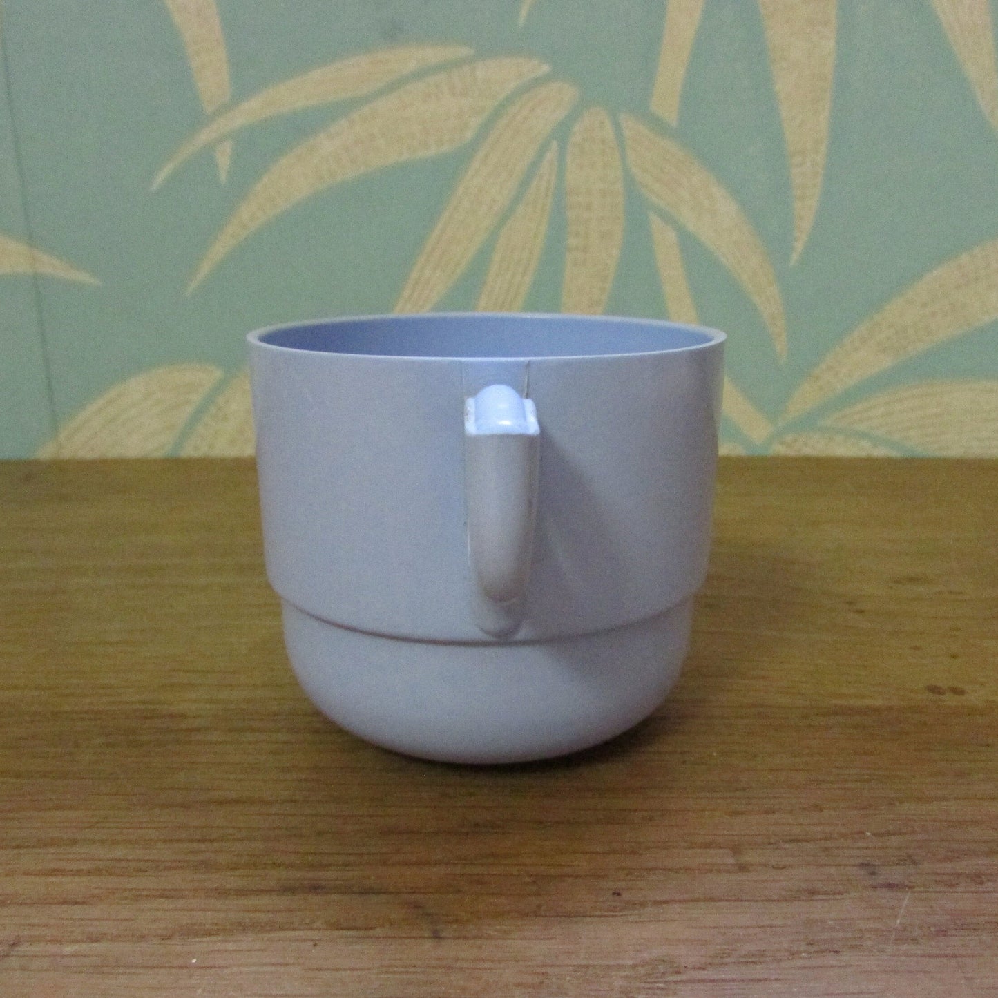 Set of four 1960s pale blue plastic stacking picnic mugs