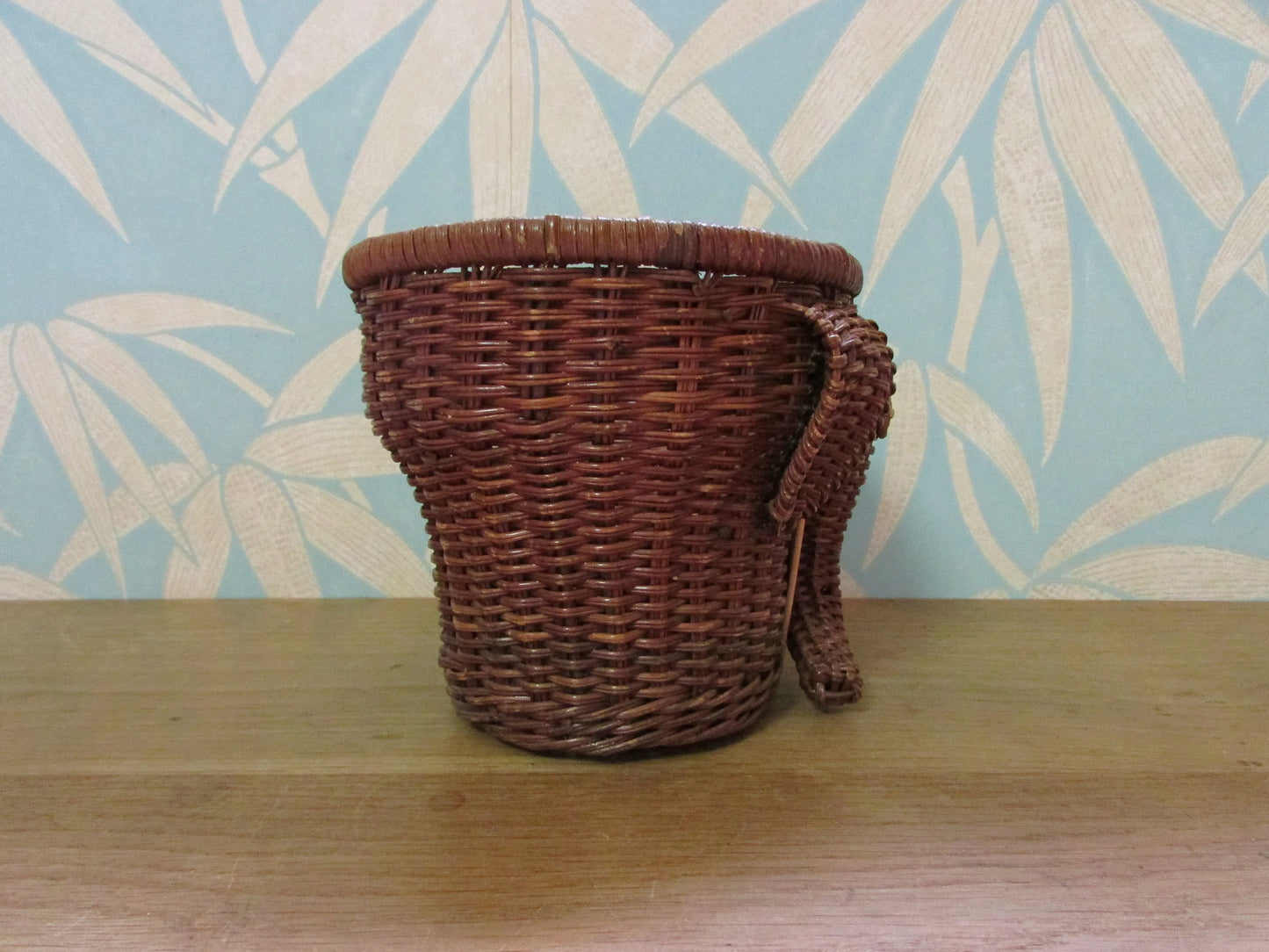 1970s wicker elephant with tusks planter/basket