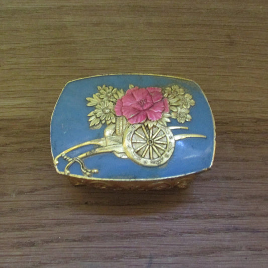 Vintage enamelled gold-tone pill/trinket box, with flower cart design, marked foreign