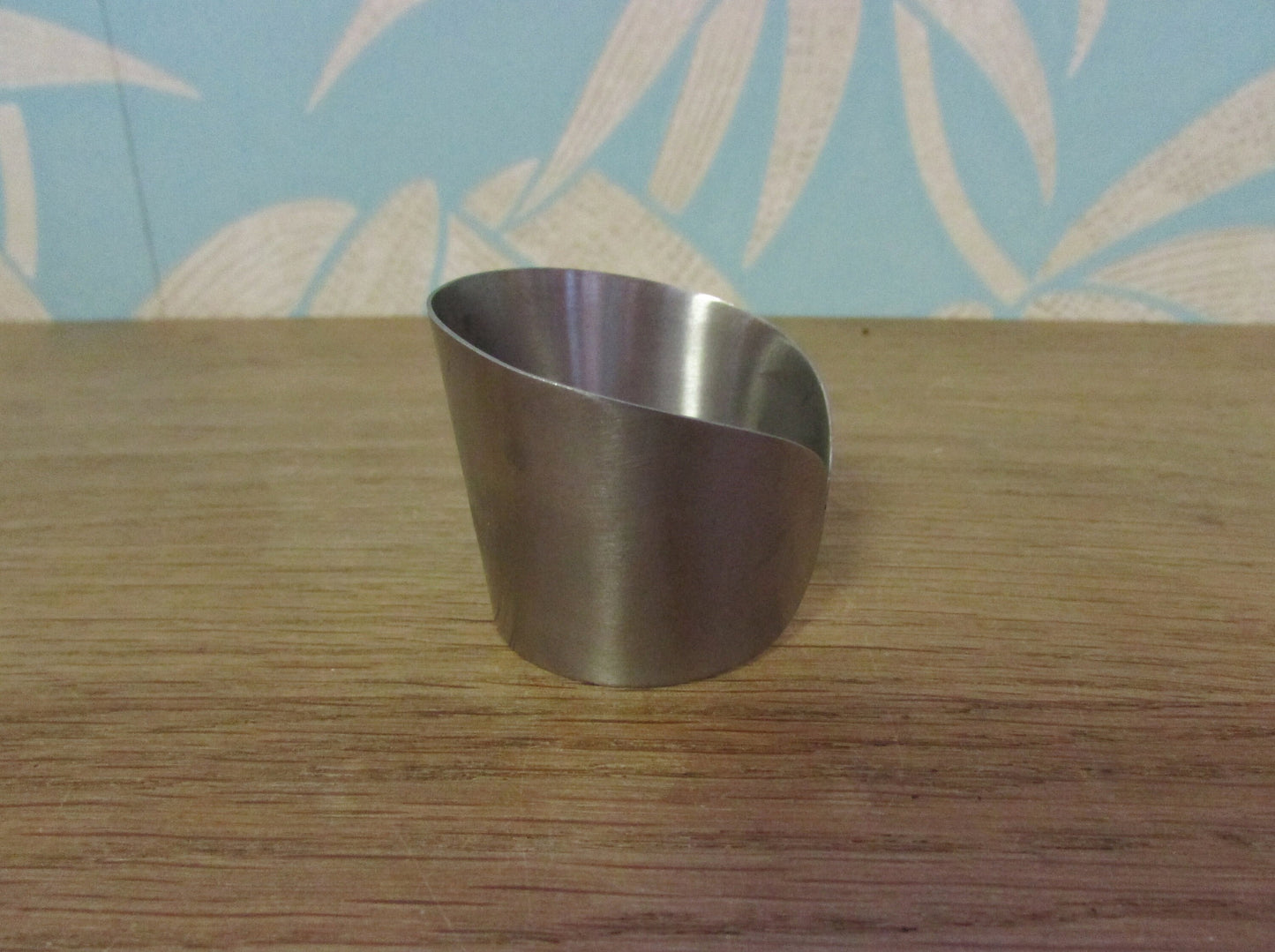 Set of 6 1970s stainless steel cuff napkin rings