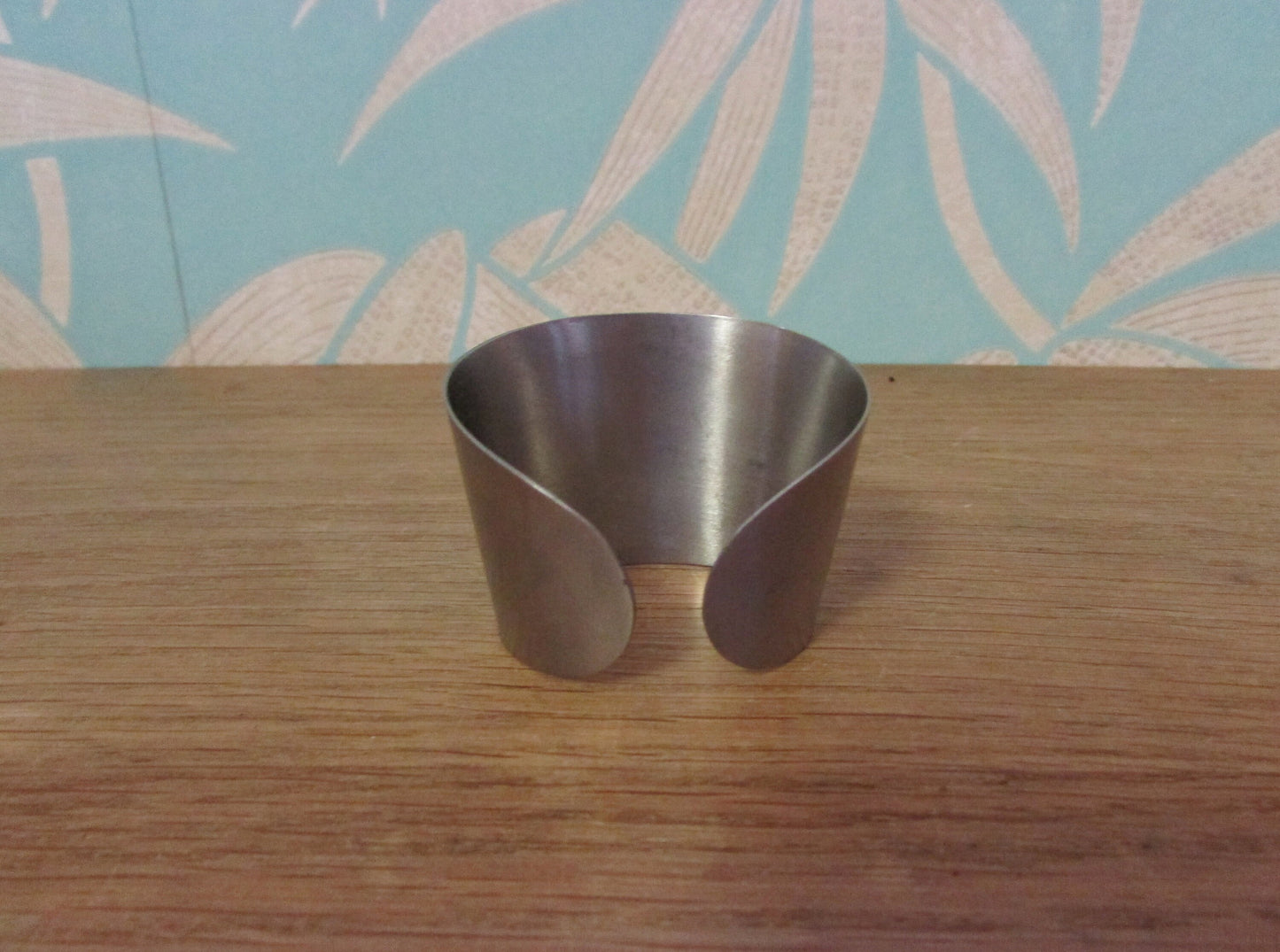 Set of 6 1970s stainless steel cuff napkin rings