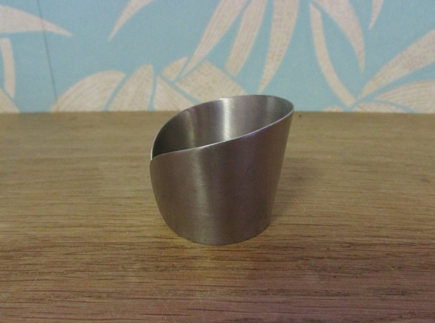 Set of 6 1970s stainless steel cuff napkin rings