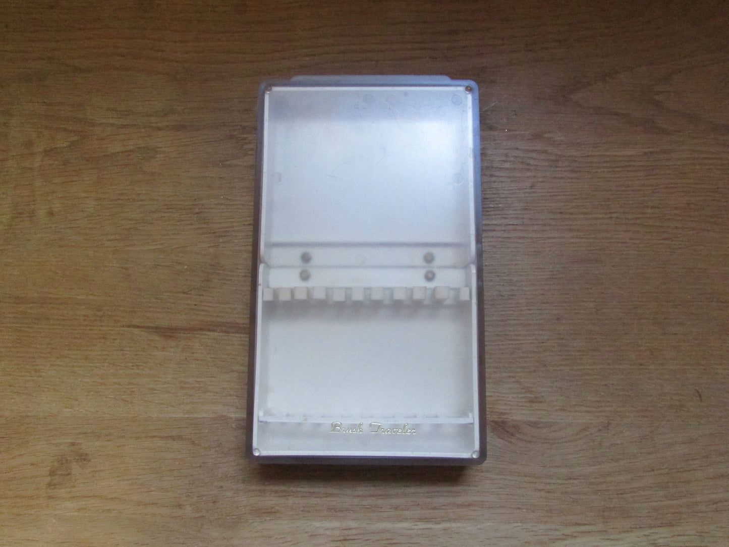 Vintage plastic 'Brush Traveler' paint brush holder
