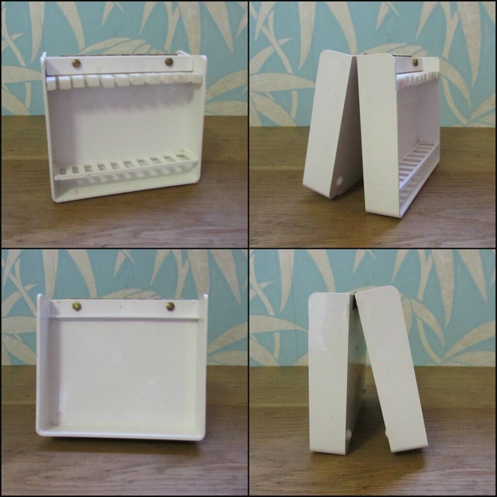 Vintage plastic 'Brush Traveler' paint brush holder