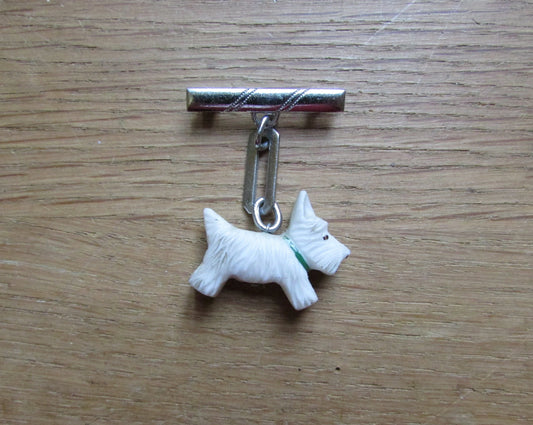 Art Deco silver-tone bar drop brooch with white celluloid Scottie dog