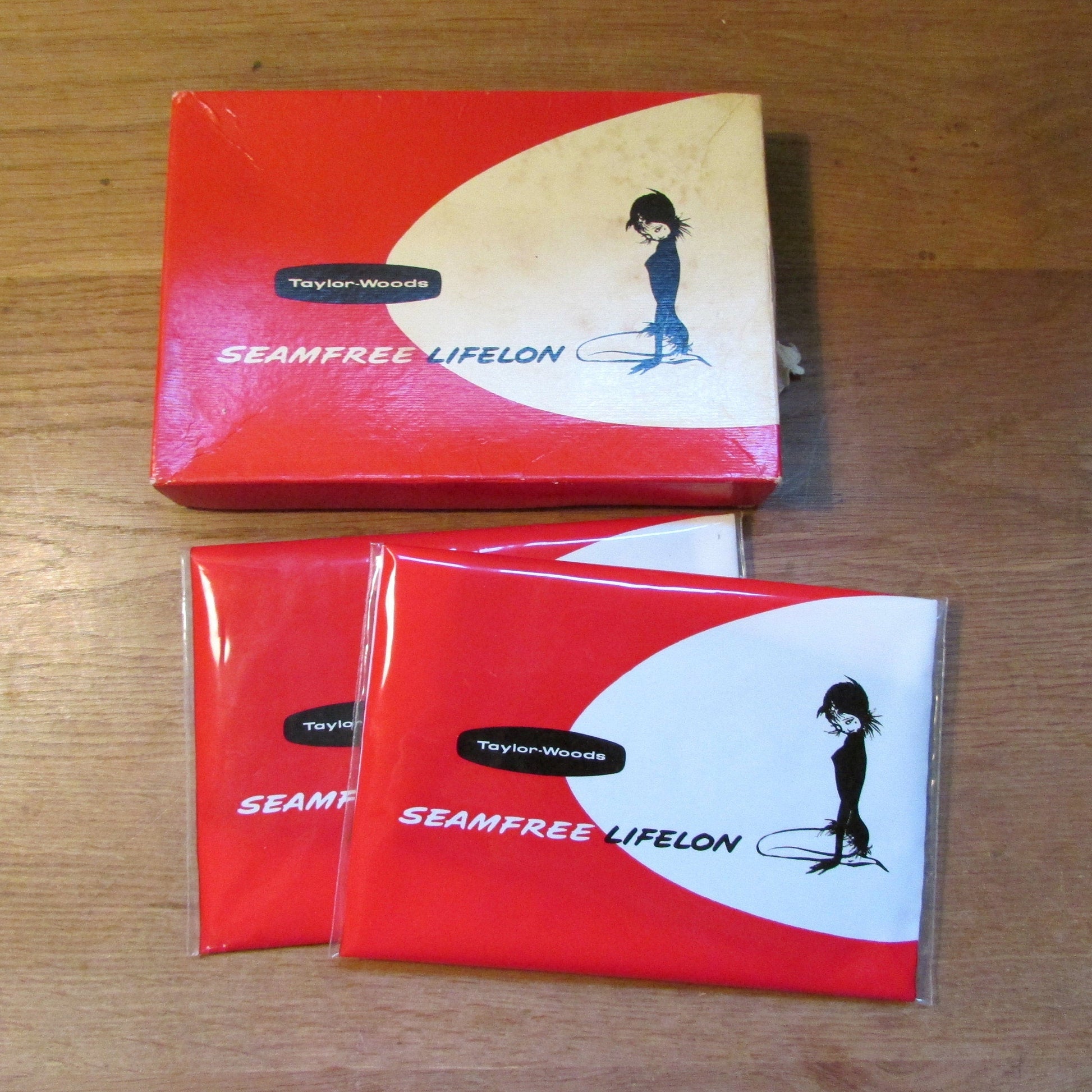 Pair of 1960sTaylor-Woods seam-free 33 Aran Amber bri-nylon stockings, size 9.5