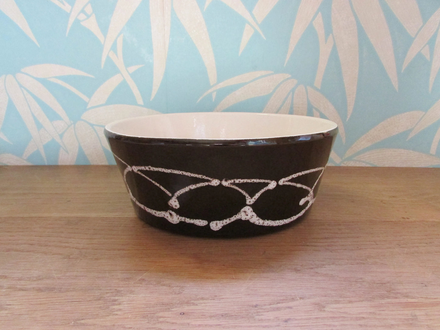 1970s large stoneware pate dish, black with white curved linear pattern
