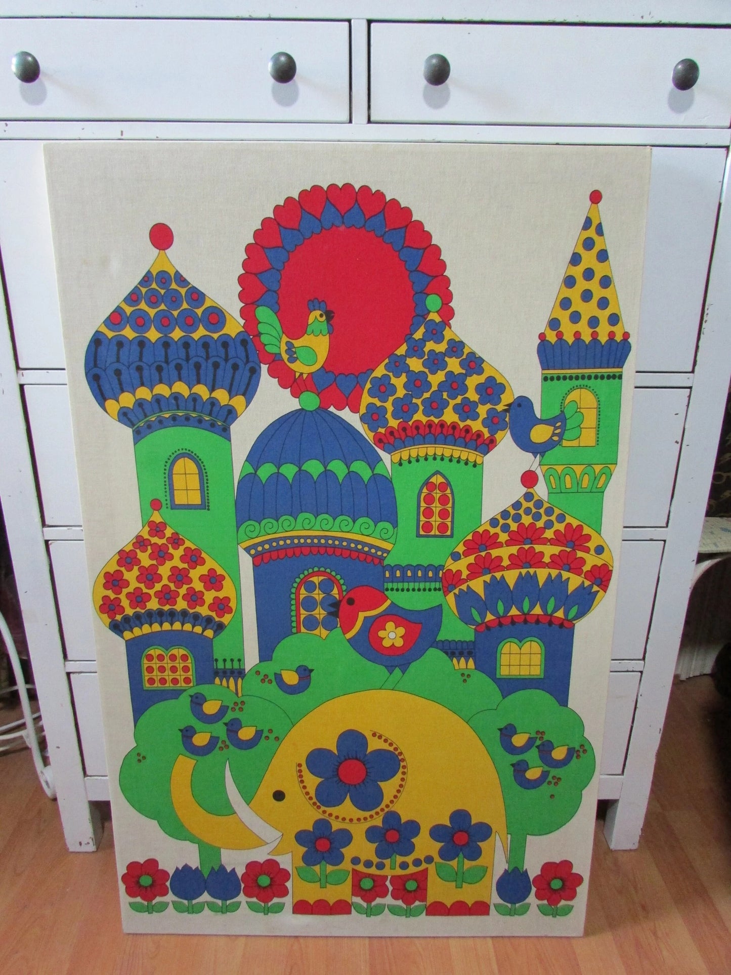 Large 1970s fabric wall hanging of yellow elephant and colourful buildings