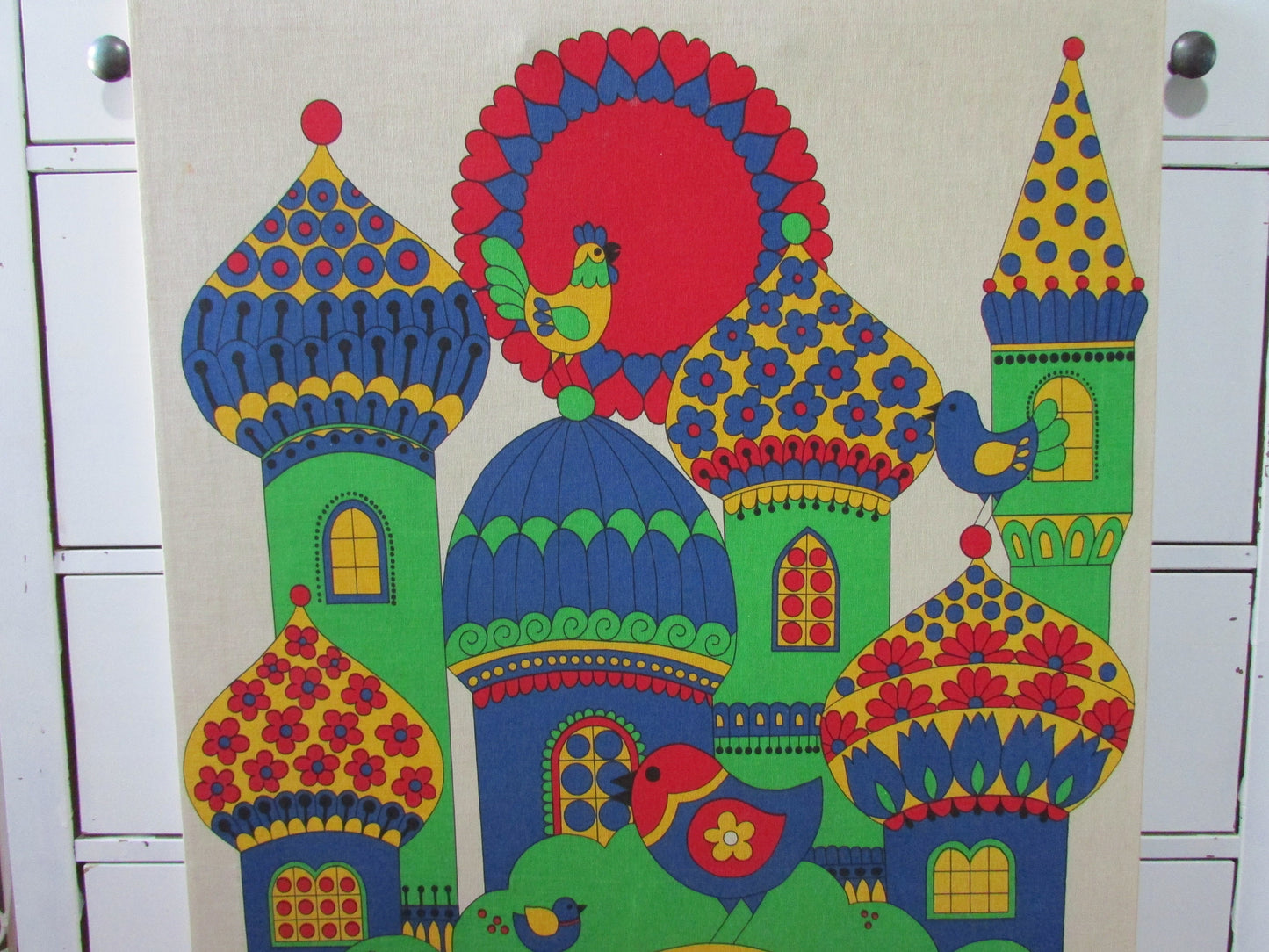 Large 1970s fabric wall hanging of yellow elephant and colourful buildings