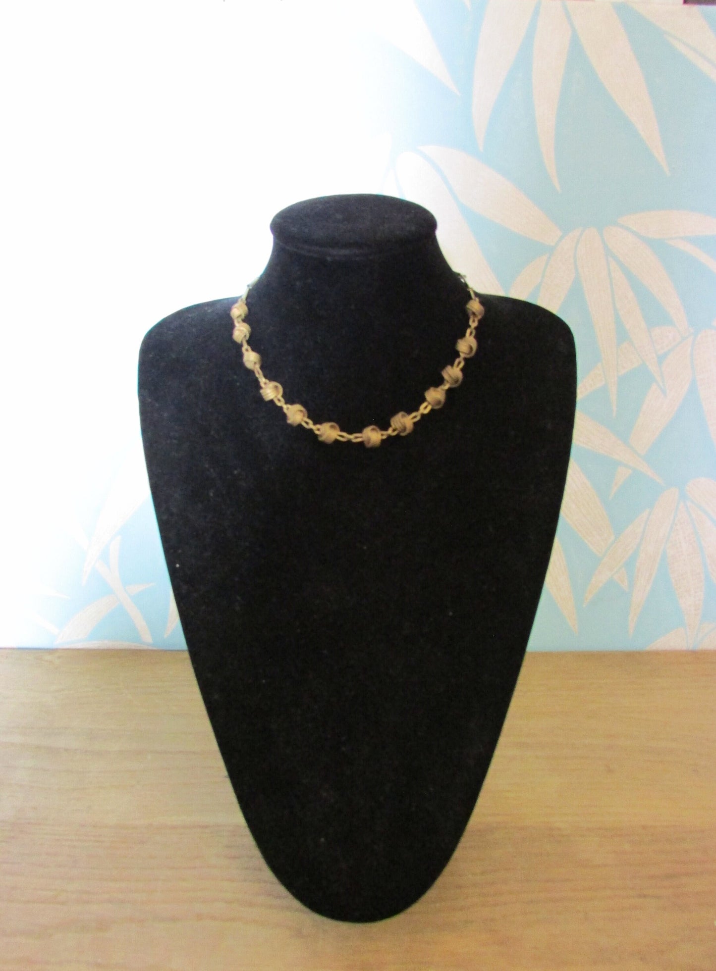1970s brass-tone love knot & chain link necklace