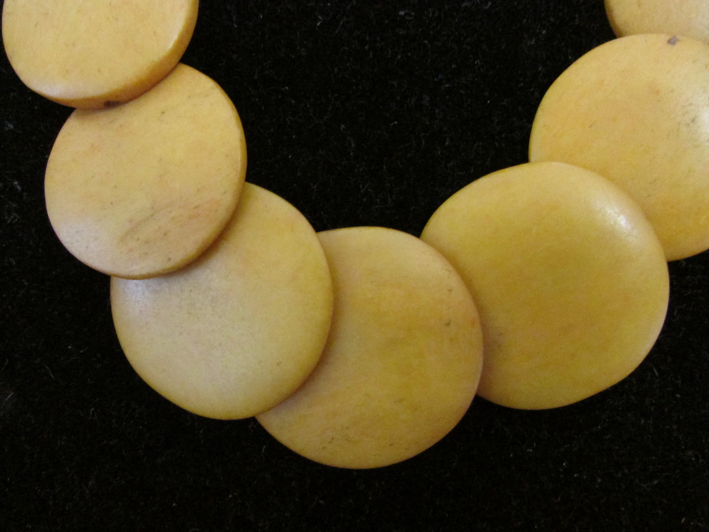 1970s yellow/mustard graduating flat disc Tagua nut necklace