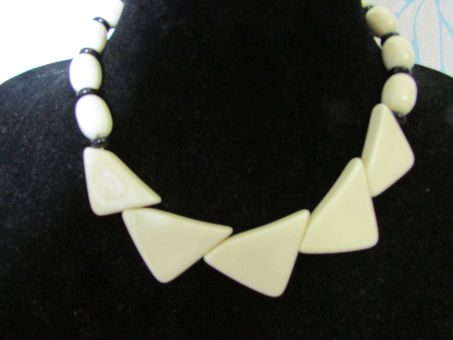 1960s white plastic geometric triangular bead necklace with black spacer beads