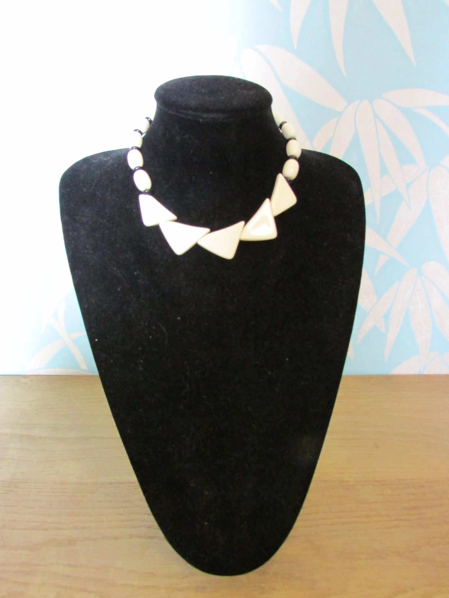 1960s white plastic geometric triangular bead necklace with black spacer beads