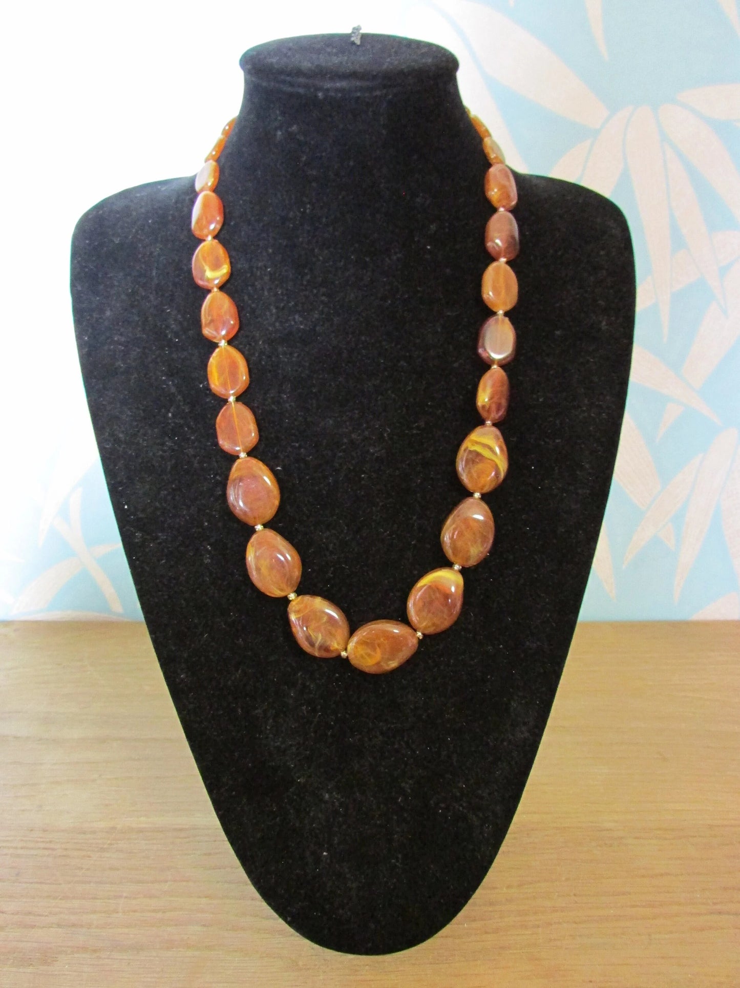 1960s amber effect marbled resin graduated oval bead necklace