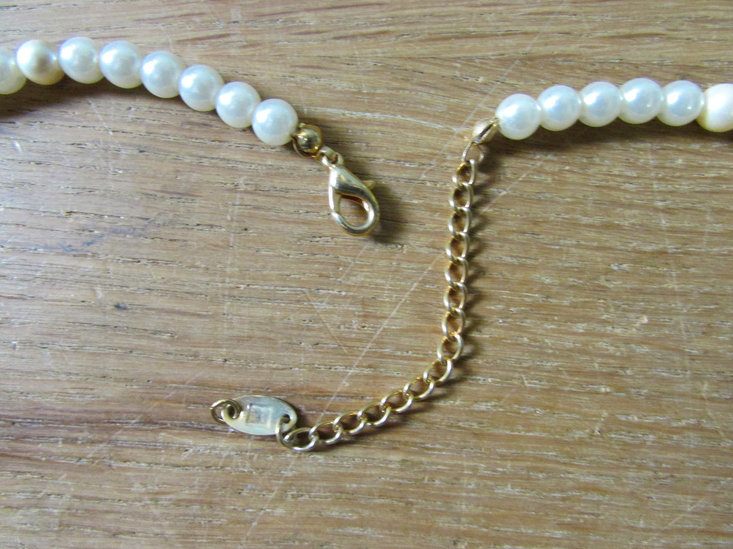 Vintage-style amethyst & pearl shard statement necklace with organic gemstone and mother of pearl design
