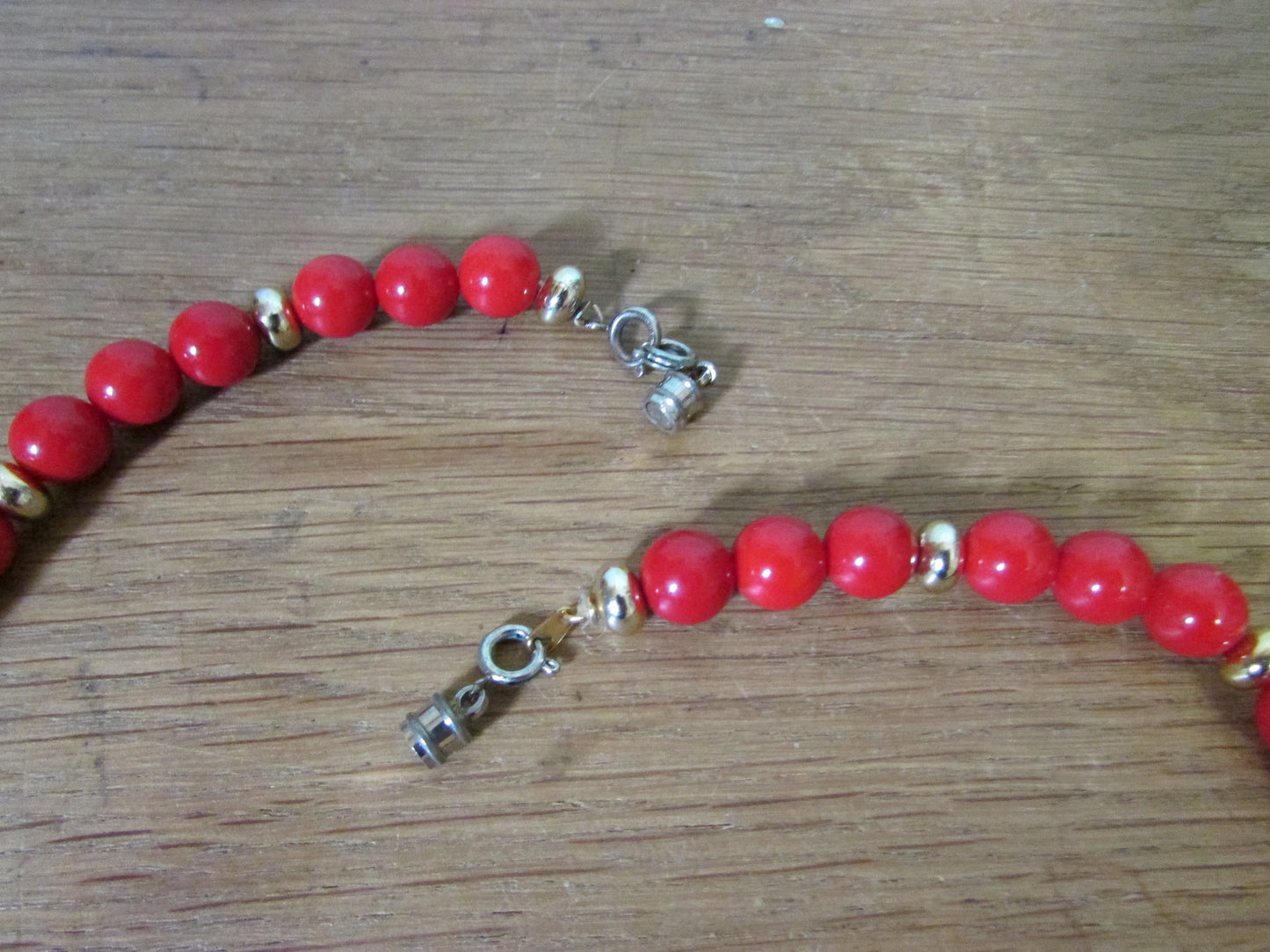 1980s red plastic bead statement necklace with sculptural centrepiece