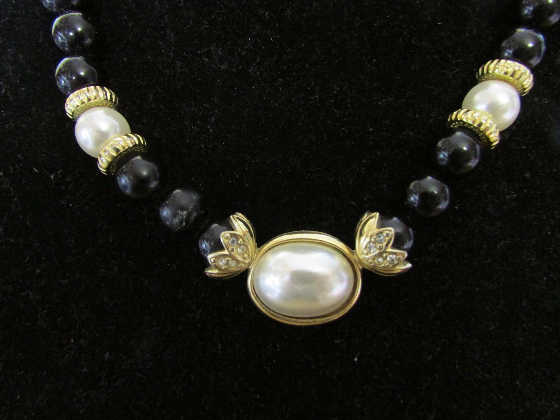 1980s Avon plastic black bead & faux pearl necklace with unusual gold-tone findings