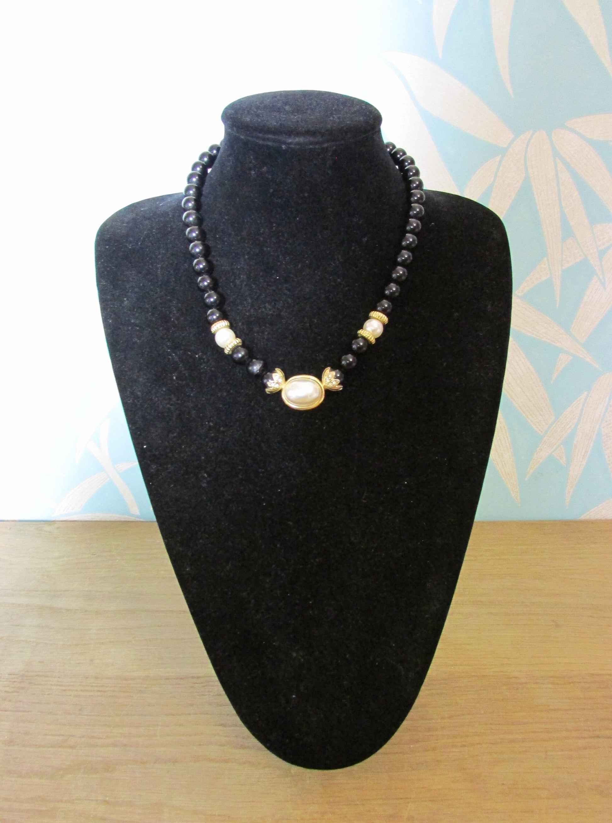 1980s Avon plastic black bead & faux pearl necklace with unusual gold-tone findings