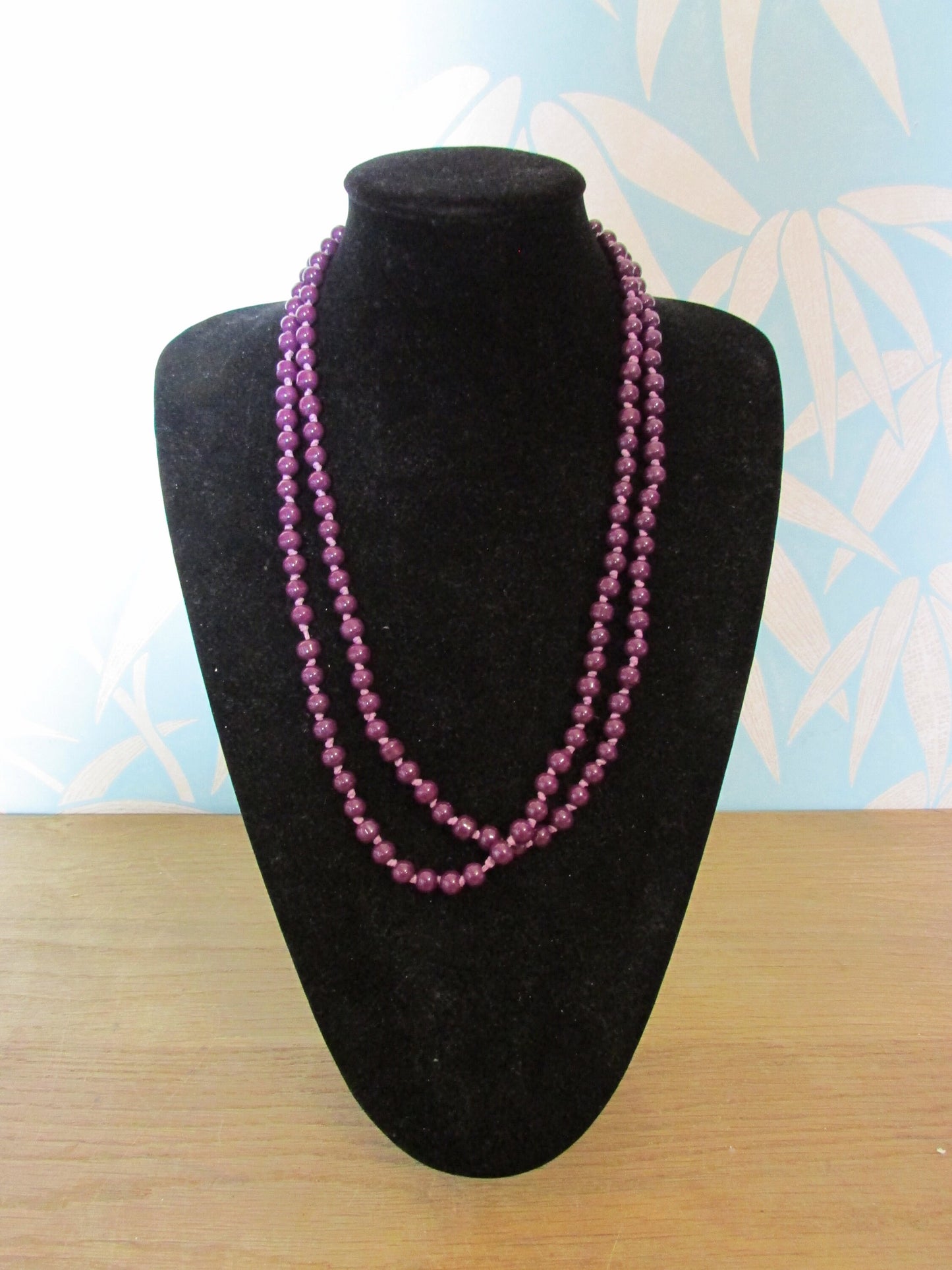 Vintage purple glass bead necklace, beads individually knotted