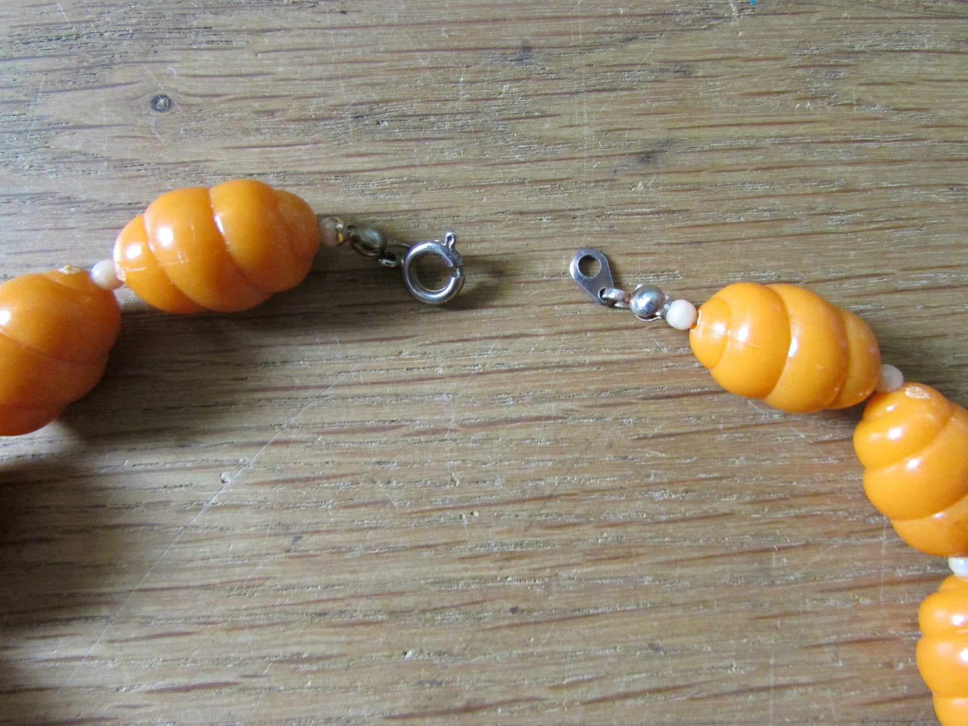 Vintage plastic caramel twisted bead collar length necklace, faux pearl spacers