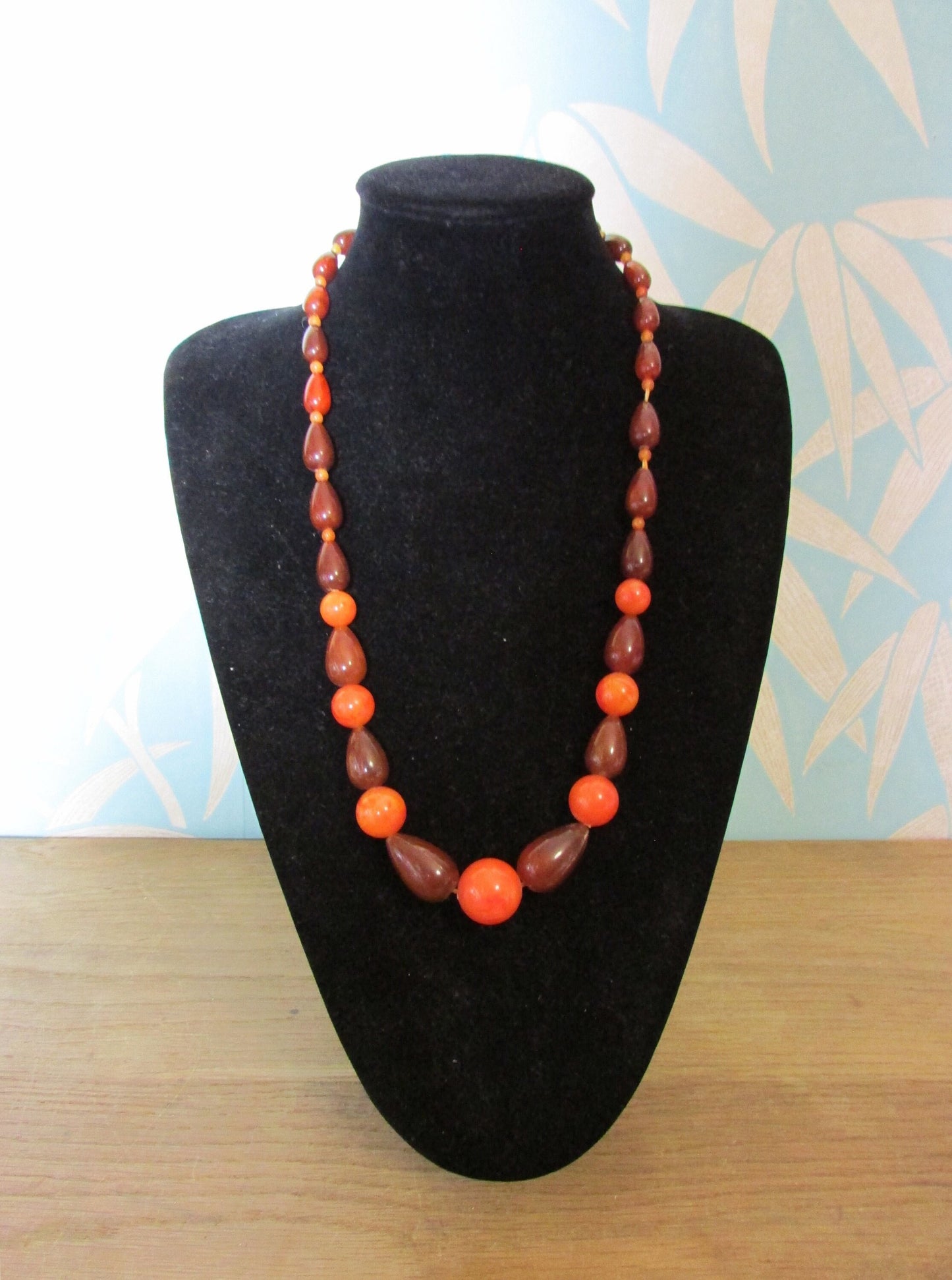 1960s orange & brown marbled plastic teardrop bead necklace with hidden clasp