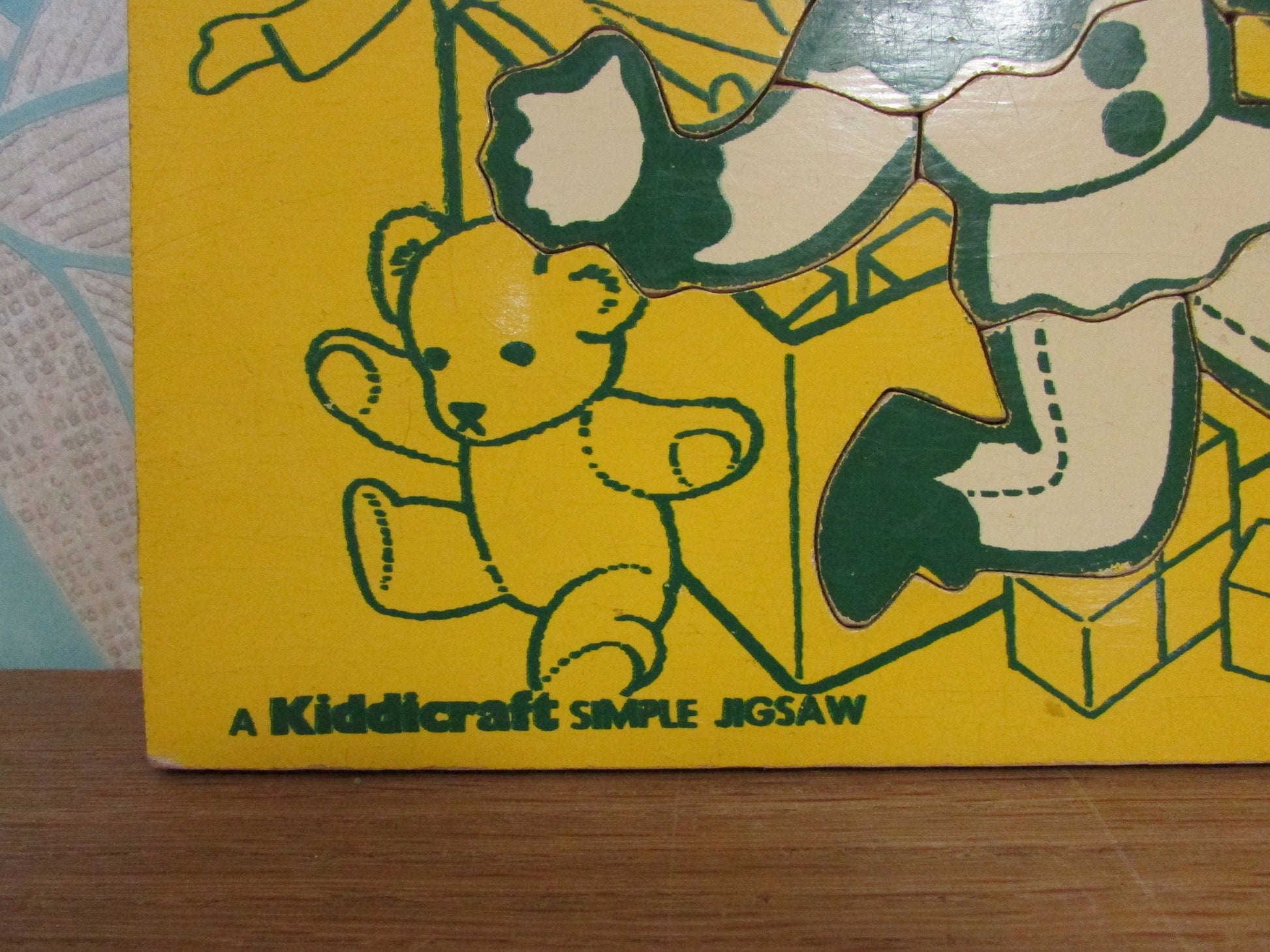1970s A Kiddicraft Simple Jigsaw (child with toybox) wooden tray puzzle