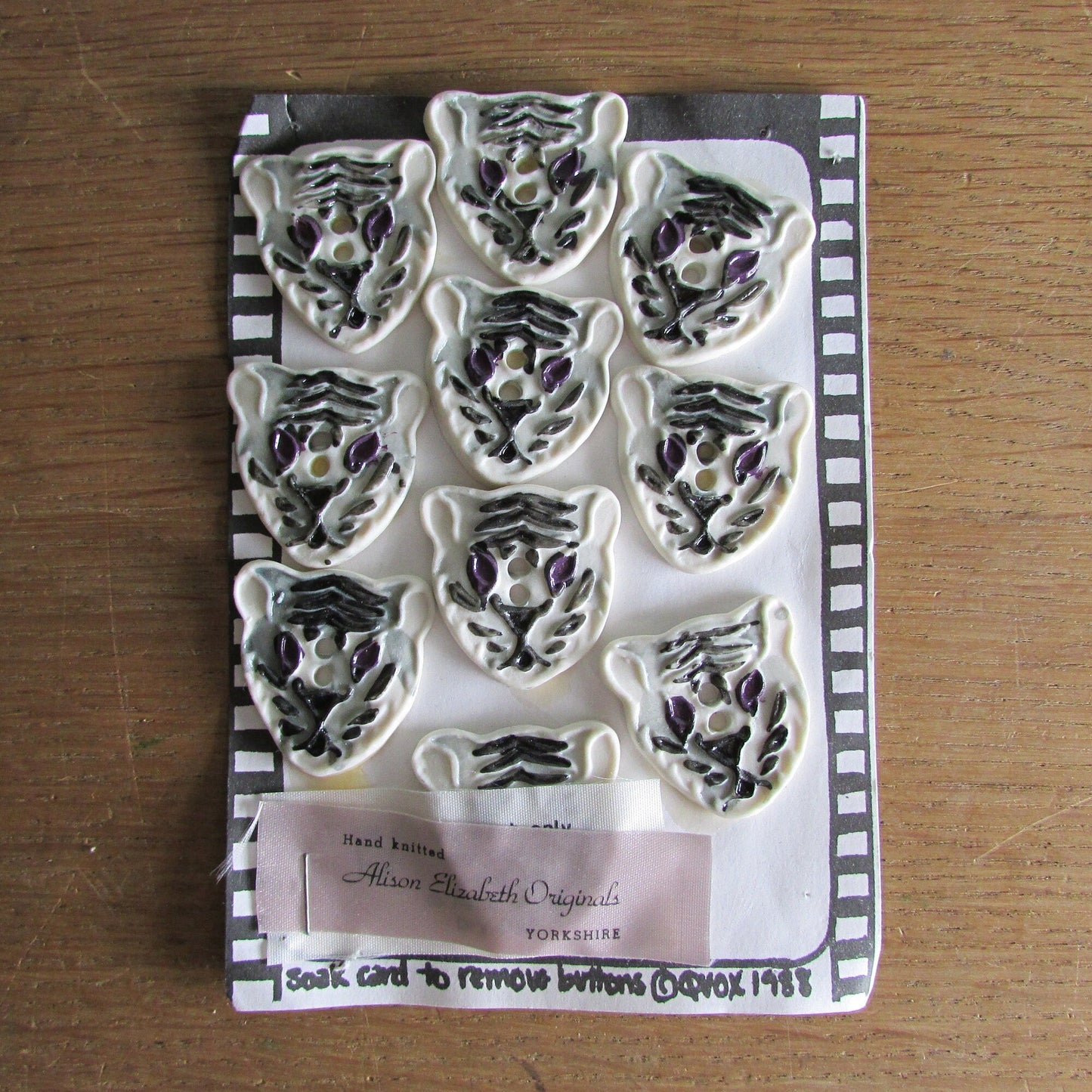 10x carded 1988 hand-painted ceramic tiger buttons