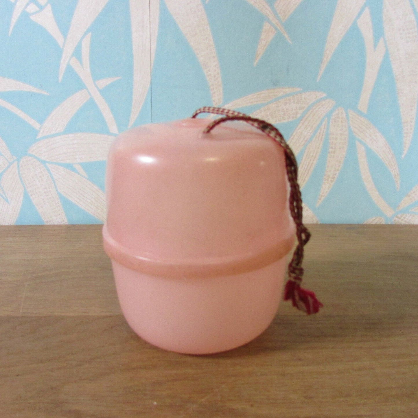 Vintage pink plastic wool/string holder