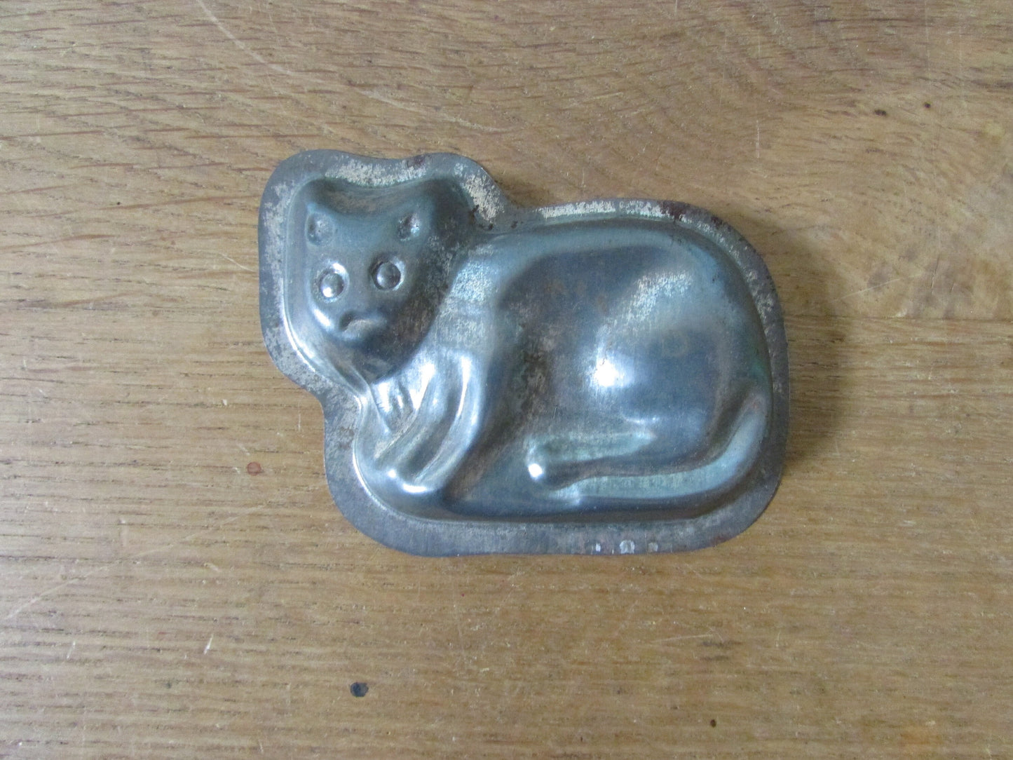 Pair of cute 1940s/50s cat shaped tin chocolate moulds