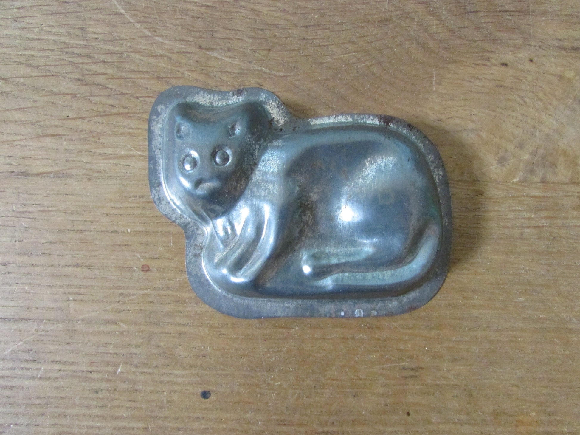 Pair of cute 1940s/50s cat shaped tin chocolate moulds