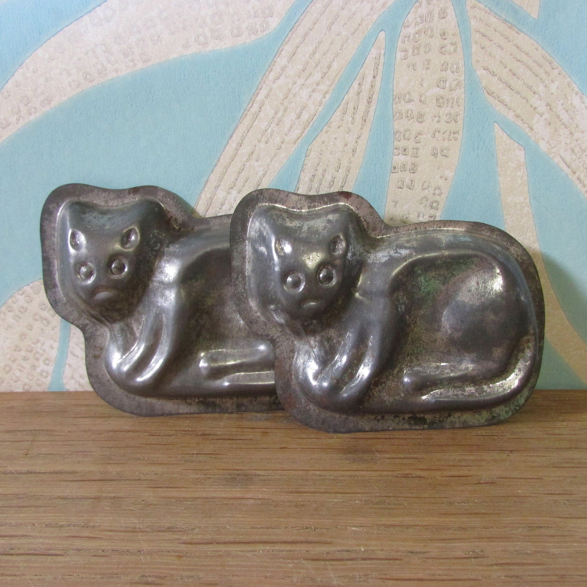 Pair of cute 1940s/50s cat shaped tin chocolate moulds