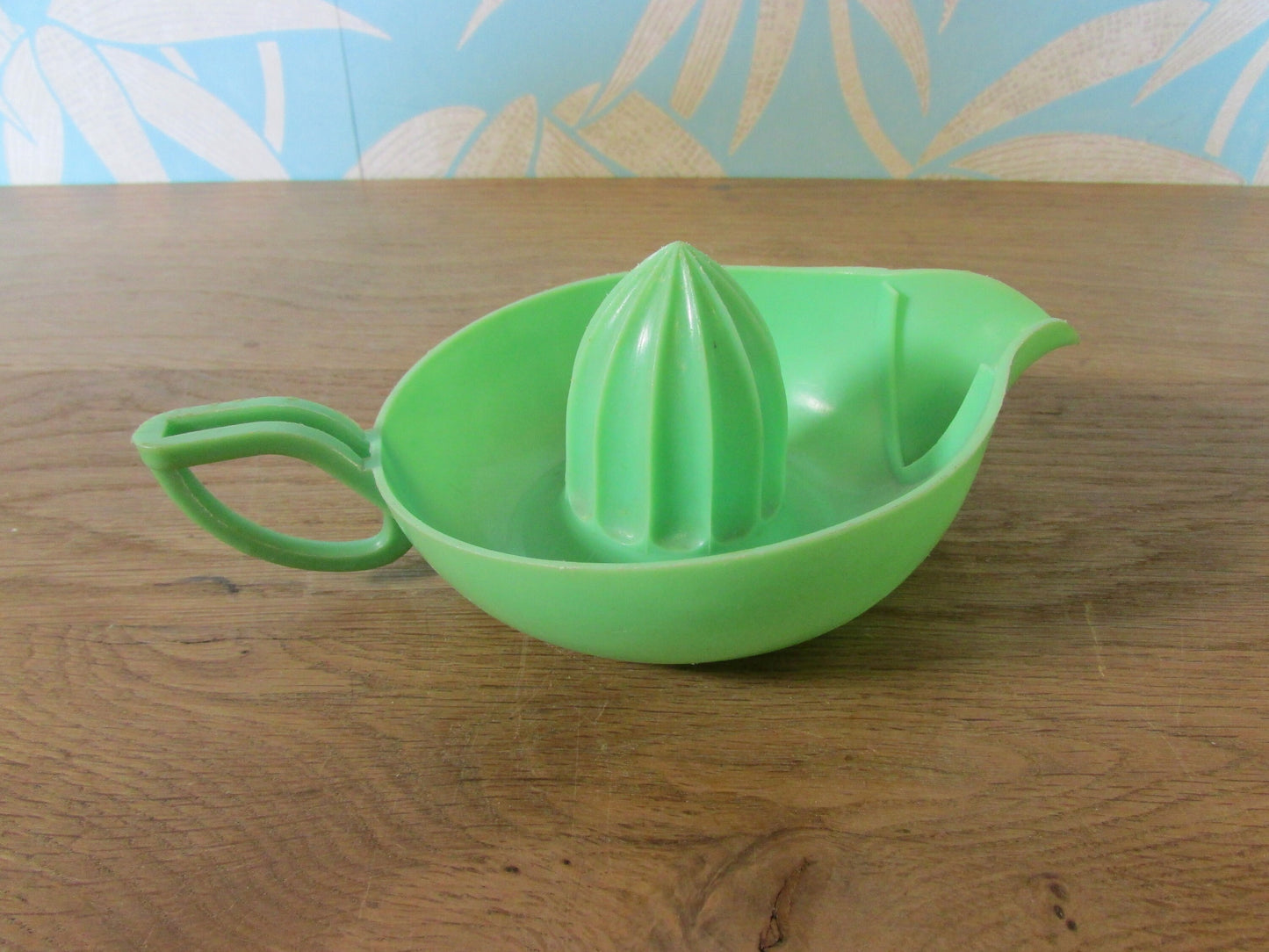 Vintage green plastic citrus juicer