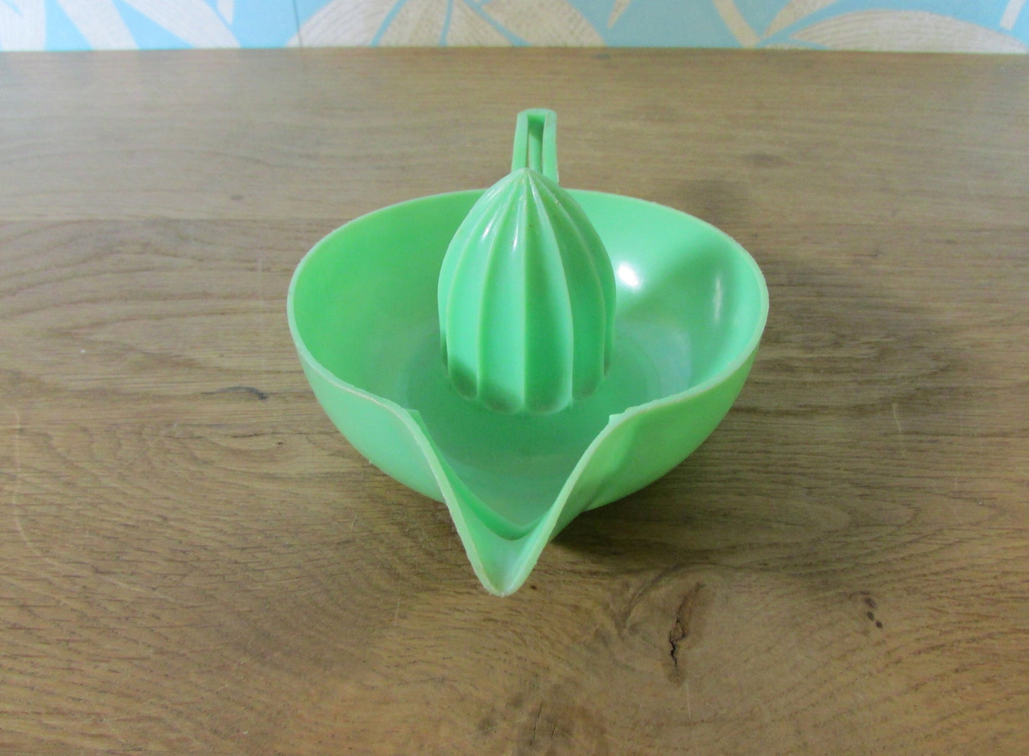Vintage green plastic citrus juicer