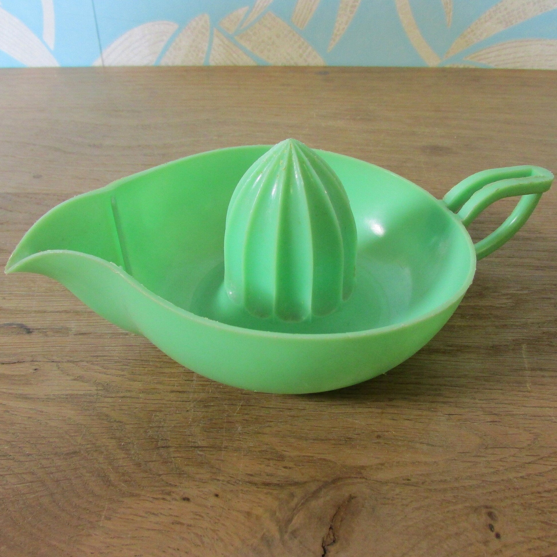 Vintage green plastic citrus juicer