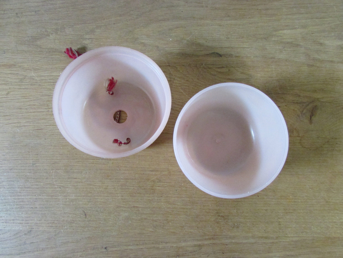 Vintage pink plastic wool/string holder