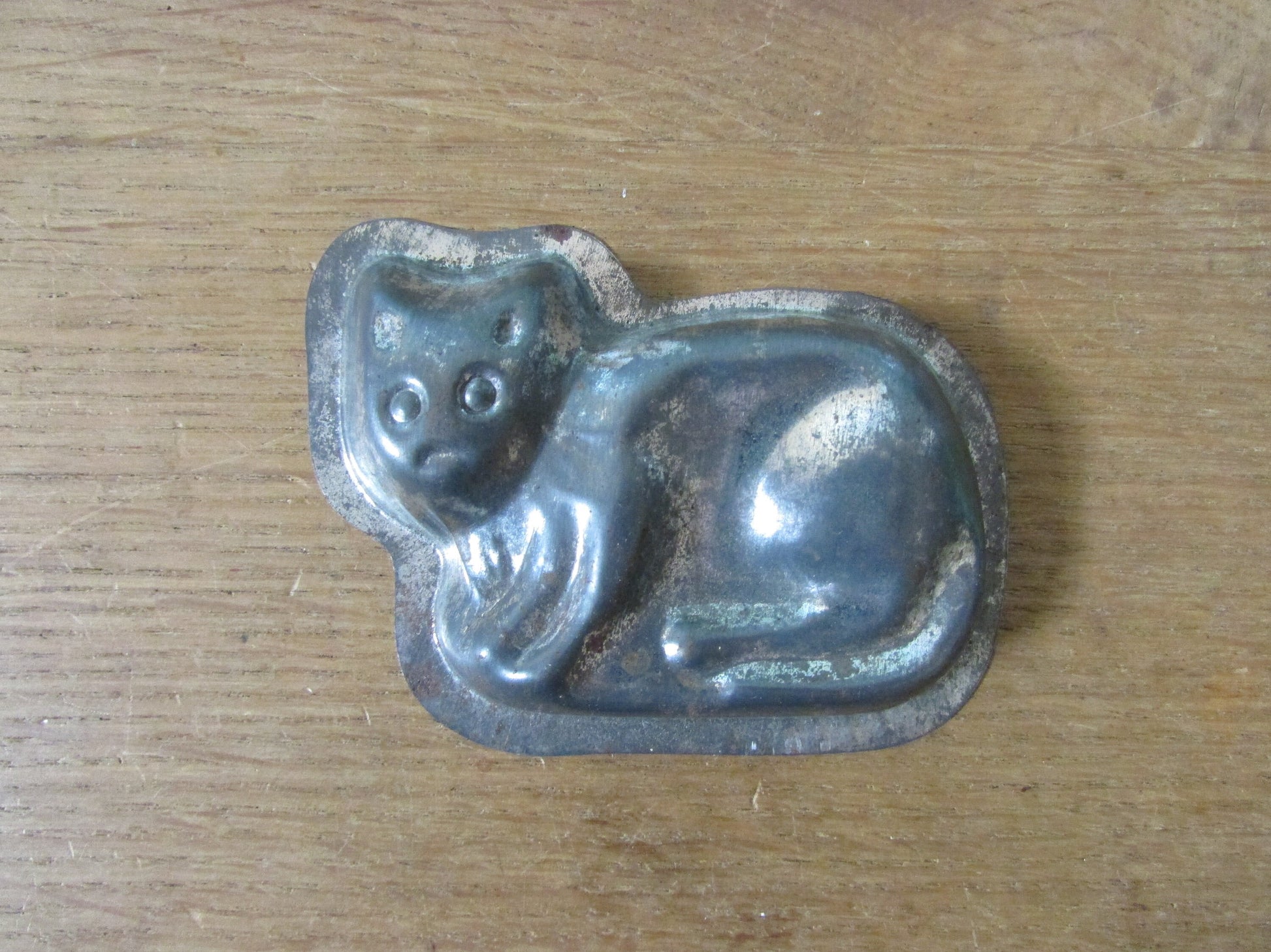 Pair of cute 1940s/50s cat shaped tin chocolate moulds