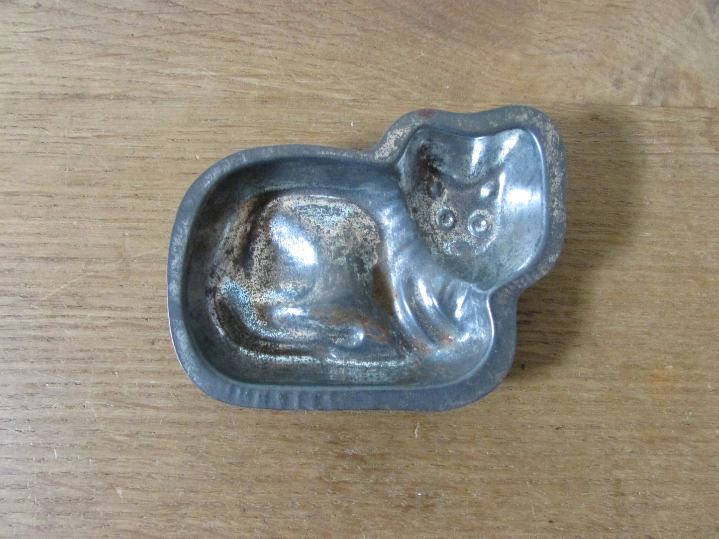 Pair of cute 1940s/50s cat shaped tin chocolate moulds