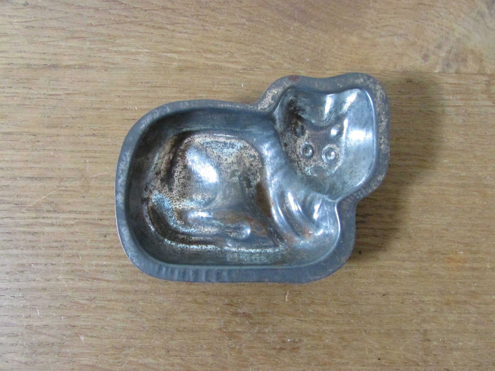 Pair of cute 1940s/50s cat shaped tin chocolate moulds