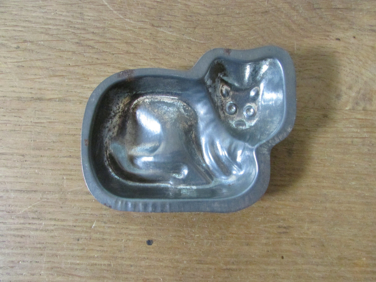 Pair of cute 1940s/50s cat shaped tin chocolate moulds