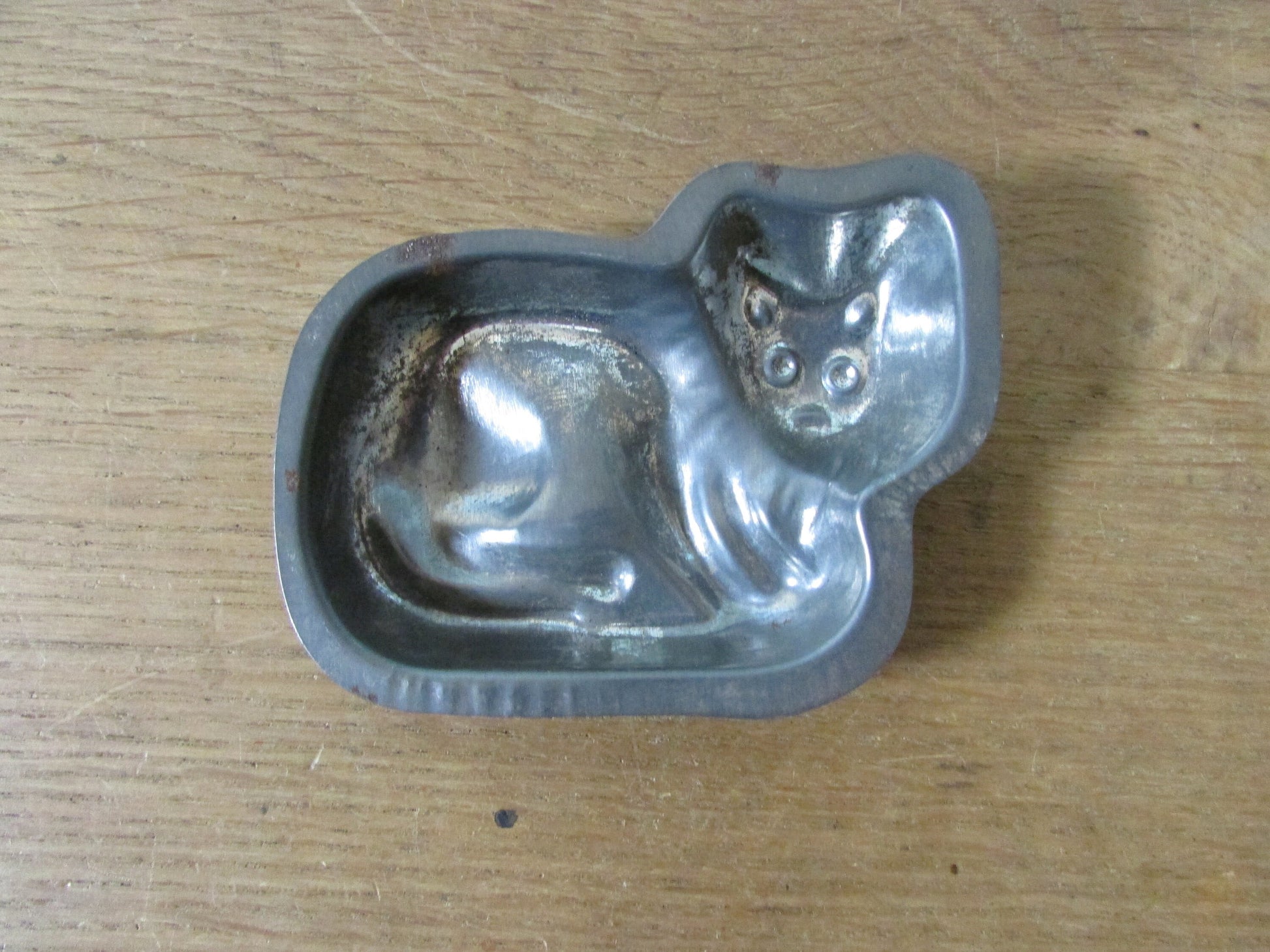 Pair of cute 1940s/50s cat shaped tin chocolate moulds