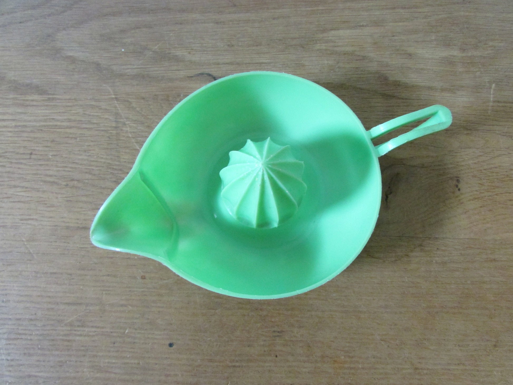 Vintage green plastic citrus juicer