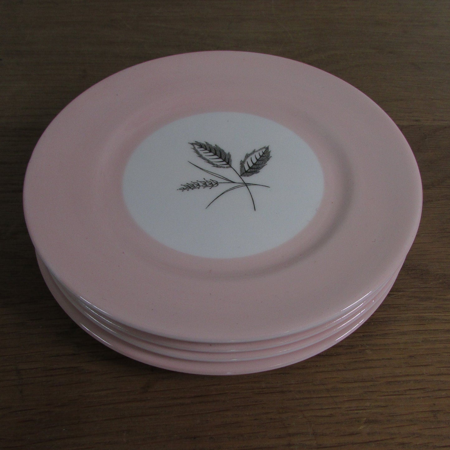 4x circa. 1950s Queen Anne bone china "Harvest Pink" side plates