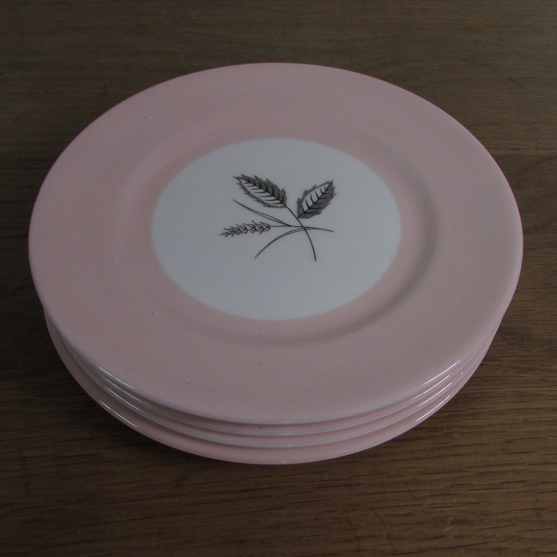 4x circa. 1950s Queen Anne bone china "Harvest Pink" side plates