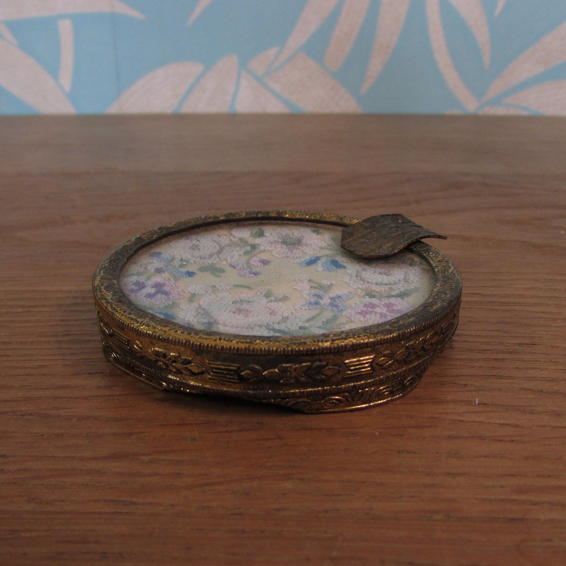 Vintage gilt metal & glass ladies ashtray with delicate petit point embroidery detail